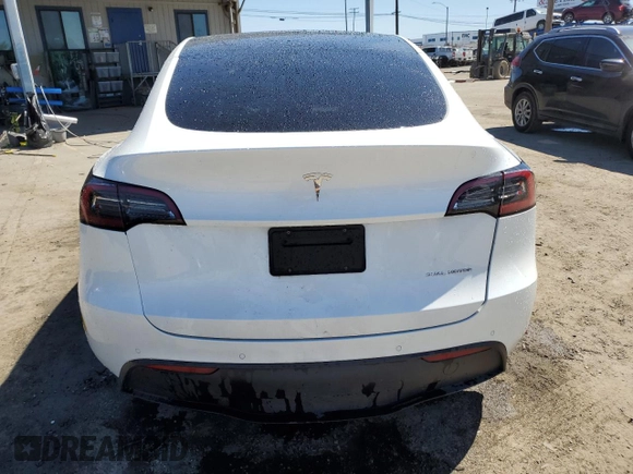 2022 Tesla Model Y Long Range z VIN 7SAYGDEEXNF455766, wystawiony jako Copart lot #49641685 z przebiegiem 51 142 mil mil oraz Szkoda całkowita • Salvage title. Historia ofert i sprzedaży dostępna na DreamBid. Obrazek 6.