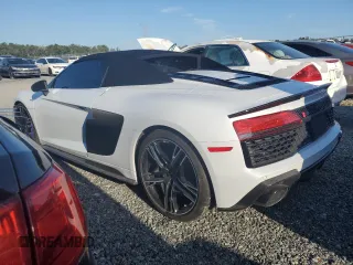 2021 Audi R8 Spyder performance z VIN WUA4BCFX5M7901463, wystawiony jako Copart lot #73882684 z przebiegiem Nie podano mil oraz Szkody całkowita. Historia ofert i sprzedaży dostępna na DreamBid. Obrazek 2.