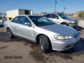 2001 Honda Accord LX z VIN 1HGCG22401A036093, wystawiony jako IAAI lot #41979056 z przebiegiem 214 918 mil mil oraz . Historia ofert i sprzedaży dostępna na DreamBid. Obrazek 1.