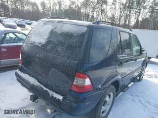 2003 Mercedes-Benz M-Class 3.7L with VIN 4JGAB57E33A421704, listed as a IAAI auction lot 41404597 with 192,078 mi miles. Bid and sale history available at carsss.com. Image 4.