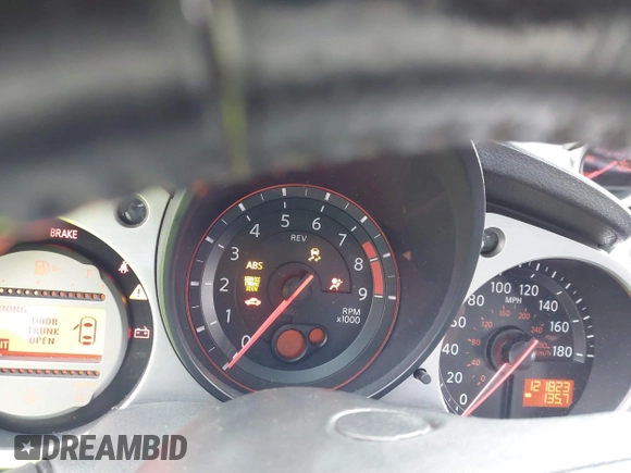 2012 Nissan 370Z Touring with VIN JN1AZ4EH4CM565125, listed as a IAAI auction lot 41630602 with 121,823 mi miles. Bid and sale history available at carsss.com. Image 7.