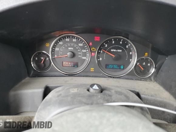 2006 Jeep Commander z VIN 1J8HH48K86C289122, wystawiony jako Copart lot #55810935 z przebiegiem 140 063 mil mil oraz Szkoda całkowita • Salvage title. Historia ofert i sprzedaży dostępna na DreamBid. Obrazek 9.