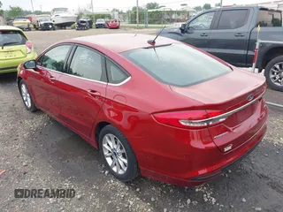 2017 Ford Fusion SE with VIN 3FA6P0H75HR221571, listed as a IAAI auction lot 42452297 with 91,354 mi miles and . Bid and sale history available at DreamBid. Image 3.