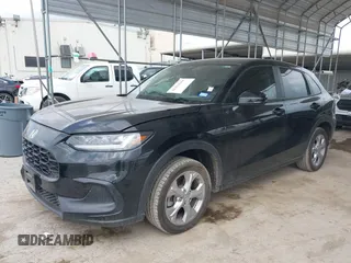 2023 Honda HR-V LX с VIN 3CZRZ1H31PM738778, выставлен на аукционе IAAI как лот 42353944 с пробегом 22 531 миль миль и . История ставок и продаж доступна на DreamBid. Изображение 2.