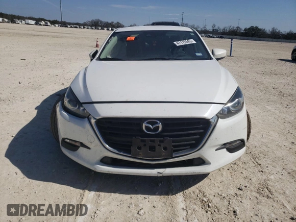 2018 Mazda 3 Touring with VIN 3MZBN1V34JM173759, listed as a Copart auction lot 47112545 with Not Provided miles and Salvage Title. Bid and sale history available at DreamBid. Image 5.