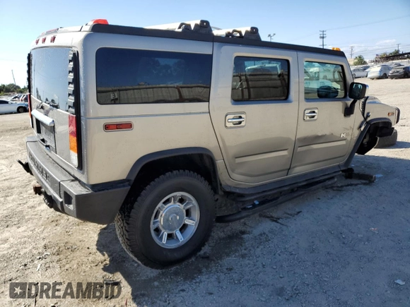 2003 Hummer H2 with VIN 5GRGN23U93H132656, listed as a Copart auction lot 71987404 with 152,287 mi miles and Salvage Title. Bid and sale history available at carsss.com. Image 3.