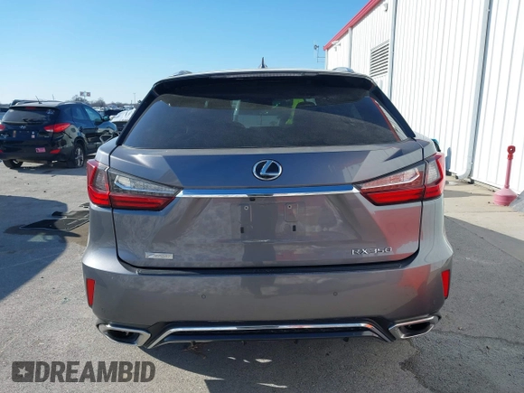 2018 Lexus RX 350 with VIN 2T2BZMCA8JC135823, listed as a IAAI auction lot 41359316 with 103,756 mi miles and . Bid and sale history available at DreamBid. Image 16.