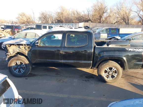 2016 Toyota Tacoma SR with VIN 3TMCZ5AN0GM023263, listed as a IAAI auction lot 41302069 with 137,276 mi miles and . Bid and sale history available at DreamBid. Image 15.