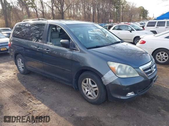 2005 Honda Odyssey EX-L with VIN 5FNRL38615B040637, listed as a IAAI auction lot 41920622 with 92,673 mi miles. Bid and sale history available at carsss.com. Image 1.