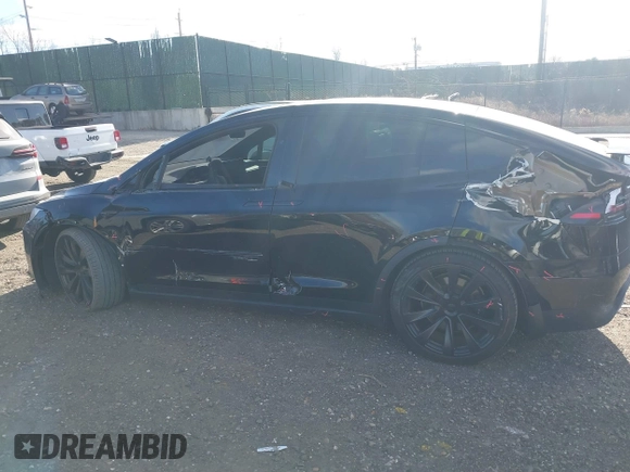 2023 Tesla Model X with VIN 7SAXCAE59PF377408, listed as a IAAI auction lot 41176738 with 32,496 mi miles and . Bid and sale history available at DreamBid. Image 14.