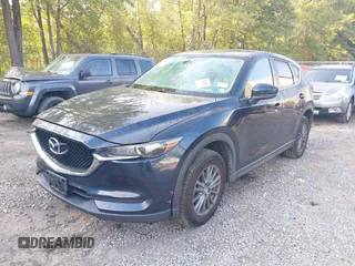 2017 Mazda CX-5 Touring with VIN JM3KFBCL6H0170455, listed as a IAAI auction lot 40381242 with 71,520 mi miles. Bid and sale history available at carsss.com. Image 2.