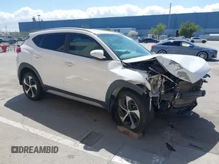 2018 Hyundai Tucson Sport with VIN KM8J33AL3JU802103, listed as a IAAI auction lot 41949054 with 96,922 mi miles and . Bid and sale history available at DreamBid. Image 1.