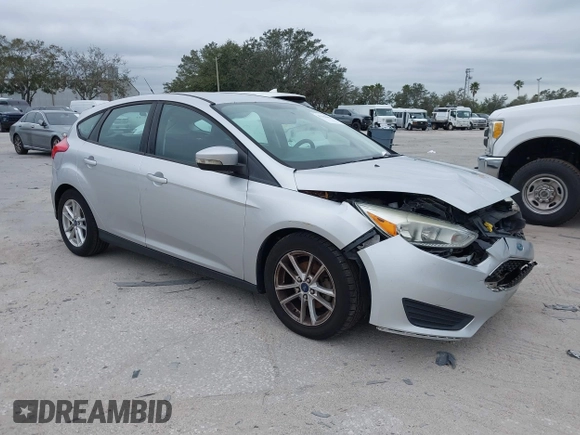 2015 Ford Focus SE with VIN 1FADP3K25FL328797, listed as a IAAI auction lot 41328404 with 72,368 mi miles. Bid and sale history available at carsss.com. Image 1.