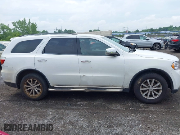 2013 Dodge Durango Crew with VIN 1C4RDJDG9DC667338, listed as a IAAI auction lot 42639559 with 137,020 mi miles and . Bid and sale history available at DreamBid. Image 13.
