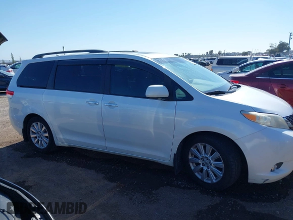 2011 Toyota Sienna XLE AAS with VIN 5TDYK3DCXBS097582, listed as a IAAI auction lot 42233594 with 226,902 mi miles and . Bid and sale history available at DreamBid. Image 13.