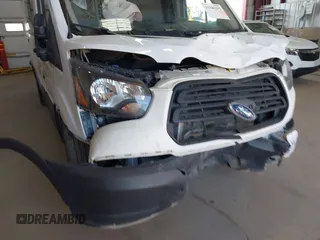 2019 Ford Transit Cargo with VIN 1FTBW3XG4KKA66859, listed as a IAAI auction lot 41940297 with 175,609 mi miles. Bid and sale history available at carsss.com. Image 6.