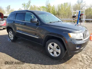 2012 Jeep Grand Cherokee Laredo with VIN 1C4RJFAG4CC203267, listed as a Copart auction lot 54910285 with 143,289 mi miles and Clean Title. Bid and sale history available at carsss.com. Image 4.
