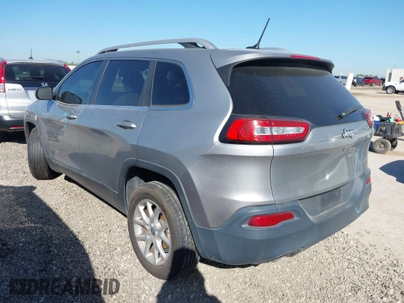 2017 Jeep Cherokee Latitude with VIN 1C4PJLCBXHW573751, listed as a IAAI auction lot 42220184 with 127,362 mi miles and . Bid and sale history available at DreamBid. Image 3.