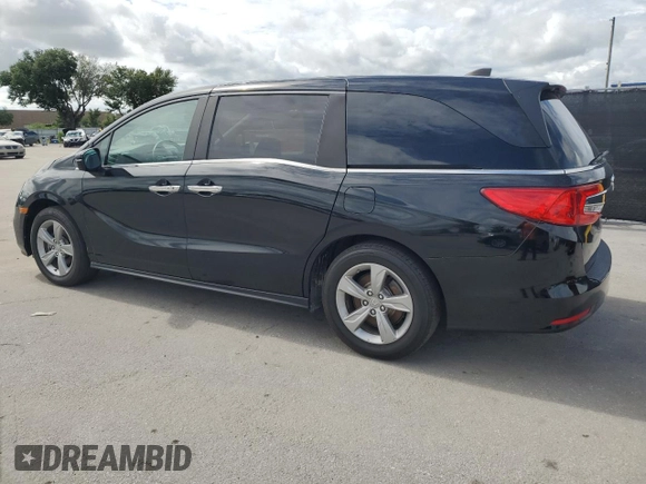 2018 Honda Odyssey EX-L z VIN 5FNRL6H7XJB031245, wystawiony jako Copart lot #59331635 z przebiegiem 74 901 mil mil oraz Czysty tytuł • Clean title. Historia ofert i sprzedaży dostępna na DreamBid. Obrazek 2.
