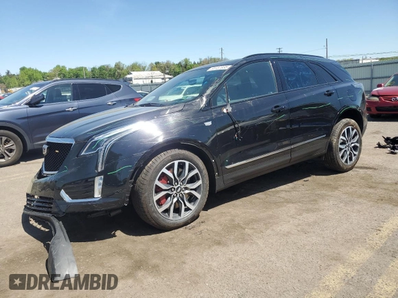 2023 Cadillac XT5 AWD Sport with VIN 1GYKNGRS8PZ100581, listed as a Copart auction lot 55157035 with 14,637 mi miles and Salvage title. Bid and sale history available at DreamBid. Image 1.