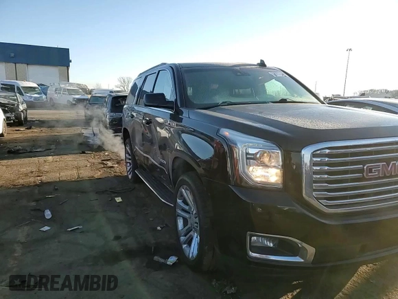 2019 GMC Yukon SLT with VIN 1GKS2BKC5KR308872, listed as a Copart auction lot 89080065 with 82,735 mi miles and Clean Title. Bid and sale history available at carsss.com. Image 12.