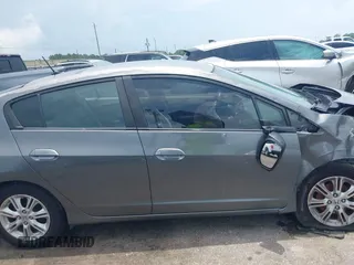 2010 Honda Insight EX z VIN JHMZE2H72AS023404, wystawiony jako IAAI lot #42505042 z przebiegiem Nie podano mil oraz . Historia ofert i sprzedaży dostępna na DreamBid. Obrazek 12.