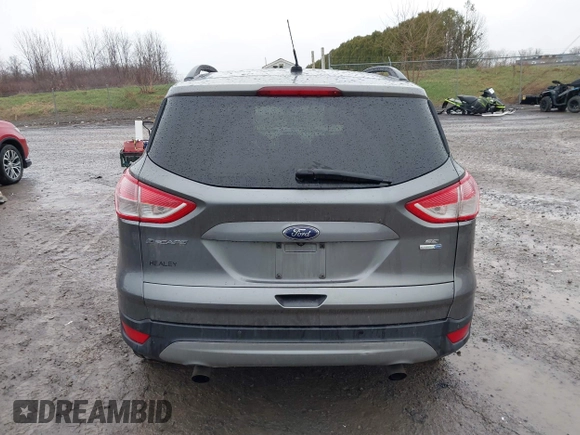 2014 Ford Escape SE with VIN 1FMCU9GX3EUB91417, listed as a IAAI auction lot 42009257 with 87,164 mi miles and . Bid and sale history available at DreamBid. Image 16.