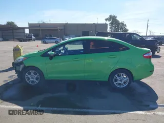 2015 Ford Fiesta SE with VIN 3FADP4BJ7FM211041, listed as a IAAI auction lot 41625903 with 135,532 mi miles. Bid and sale history available at carsss.com. Image 15.