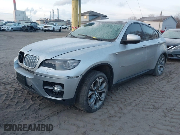 2012 BMW X6 50i z VIN 5UXFG8C58CL590171, wystawiony jako IAAI lot #41087730 z przebiegiem 83 143 mil mil oraz . Historia ofert i sprzedaży dostępna na DreamBid. Obrazek 17.