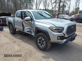 2022 Toyota Tacoma SR z VIN 3TMCZ5ANXNM497511, wystawiony jako IAAI lot #41670710 z przebiegiem 26 277 mil mil oraz . Historia ofert i sprzedaży dostępna na DreamBid. Obrazek 1.