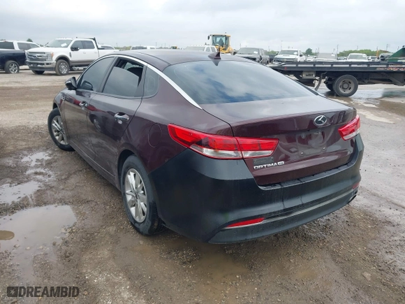 2016 Kia Optima LX with VIN 5XXGT4L3XGG027430, listed as a IAAI auction lot 41940146 with 75,456 mi miles. Bid and sale history available at carsss.com. Image 3.