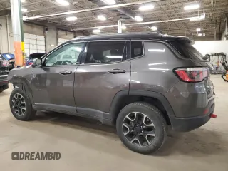 2019 Jeep Compass Trailhawk with VIN 3C4NJDDB1KT618892, listed as a Copart auction lot 49156585 with 93,842 mi miles and Salvage Title. Bid and sale history available at carsss.com. Image 2.
