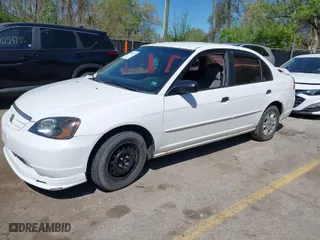 2002 Honda Civic LX with VIN 1HGES165X2L009591, listed as a IAAI auction lot 42048933 with 202,074 mi miles. Bid and sale history available at carsss.com. Image 2.