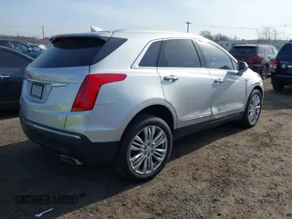 2019 Cadillac XT5 Premium Luxury AWD z VIN 1GYKNFRS2KZ227166, wystawiony jako IAAI lot #41786410 z przebiegiem 99 576 mil mil oraz . Historia ofert i sprzedaży dostępna na DreamBid. Obrazek 4.