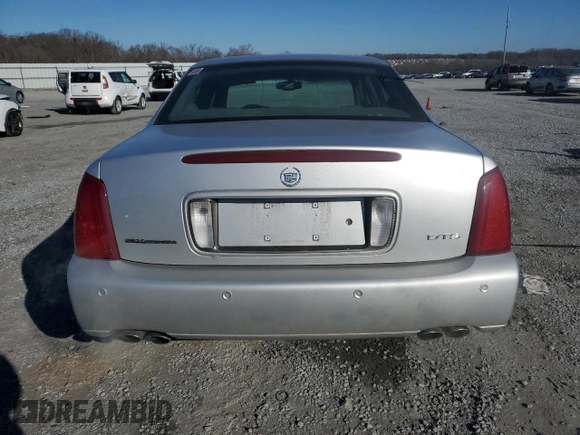 2002 Cadillac DeVille DTS with VIN 1G6KF57922U124813, listed as a Copart auction lot 87055984 with 94,769 mi miles and Salvage Title. Bid and sale history available at carsss.com. Image 6.