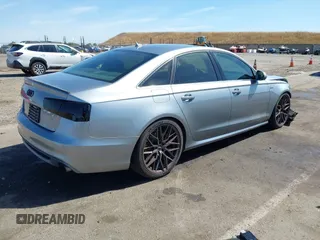 2013 Audi A6 Prestige z VIN WAUJGAFC2DN088630, wystawiony jako IAAI lot #42272569 z przebiegiem 110 324 mil mil oraz . Historia ofert i sprzedaży dostępna na DreamBid. Obrazek 4.