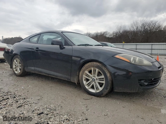 2007 Hyundai Tiburon GS with VIN KMHHM66D17U248440, listed as a Copart auction lot 86642384 with 125,156 mi miles and Clean Title. Bid and sale history available at carsss.com. Image 4.