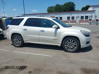 2014 GMC Acadia Denali with VIN 1GKKVTKD1EJ220183, listed as a IAAI auction lot 42230611 with 103,789 mi miles and . Bid and sale history available at carsss.com. Image 13.