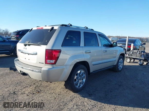 2010 Jeep Grand Cherokee Limited with VIN 1J4RR5GT9AC135837, listed as a IAAI auction lot 41617104 with 75,757 mi miles and . Bid and sale history available at DreamBid. Image 4.