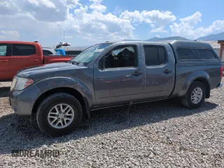 2016 Nissan Frontier SV with VIN 1N6AD0FV5GN780728, listed as a Copart auction lot 59890745 with 135,059 mi miles and Salvage title. Bid and sale history available at DreamBid. Image 1.