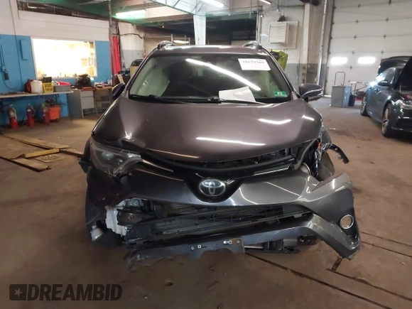 2018 Toyota RAV4 XLE with VIN JTMRFREV8JJ208377, listed as a IAAI auction lot 41629369 with 160,870 mi miles. Bid and sale history available at carsss.com. Image 12.