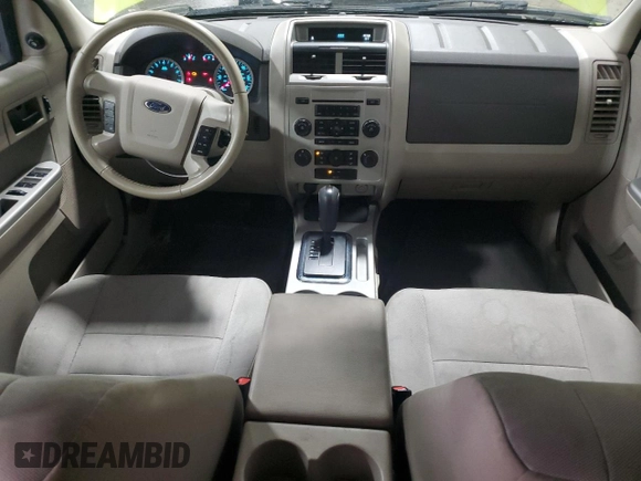 2012 Ford Escape XLT with VIN 1FMCU9D7XCKA07488, listed as a Copart auction lot 58605185 with 144,578 mi miles and Salvage title. Bid and sale history available at DreamBid. Image 8.