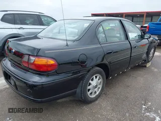 1999 Chevrolet Malibu LS with VIN 1G1NE52M1X6202060, listed as a IAAI auction lot 42011861 with 203,273 mi miles and . Bid and sale history available at DreamBid. Image 4.