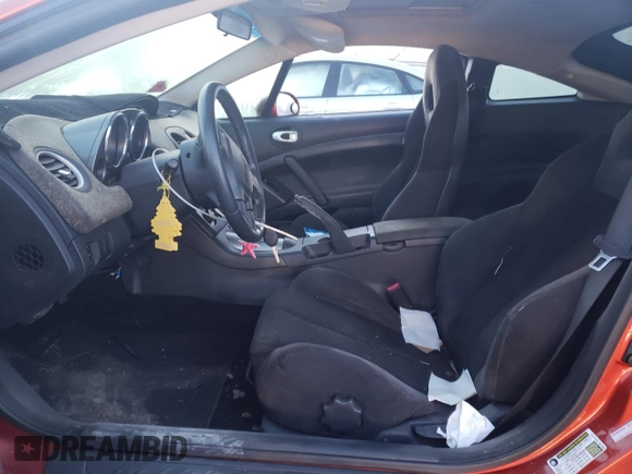 2006 Mitsubishi Eclipse GS z VIN 4A3AK24F96E010821, wystawiony jako Copart lot #70957064 z przebiegiem Nie podano mil oraz Nie do naprawy • Non repairable. Historia ofert i sprzedaży dostępna na DreamBid. Obrazek 7.