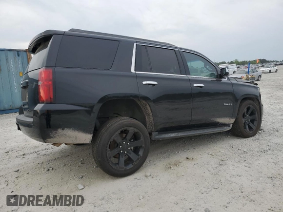 2017 Chevrolet Tahoe LS with VIN 1GNSCAKCXHR345290, listed as a Copart auction lot 53790035 with 134,212 mi miles and Salvage title. Bid and sale history available at DreamBid. Image 3.