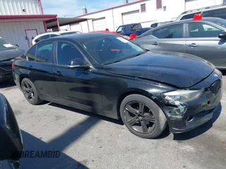 2014 BMW 3 Series 320i with VIN WBA3B1G5XENS80130, listed as a IAAI auction lot 42304306 with 125,743 mi miles and . Bid and sale history available at DreamBid. Image 12.