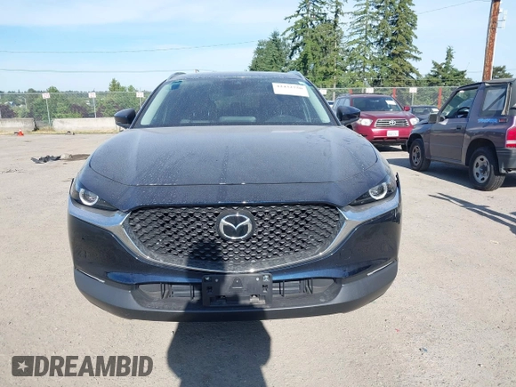 2023 Mazda CX-30 S Select with VIN 3MVDMBBM4PM558831, listed as a IAAI auction lot 42432750 with 12,468 mi miles and . Bid and sale history available at DreamBid. Image 13.