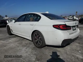2023 BMW 5 Series 530e with VIN WBA13AG02PCL73814, listed as a Copart auction lot 86818824 with Not provided miles and Salvage title. Bid and sale history available at DreamBid. Image 2.