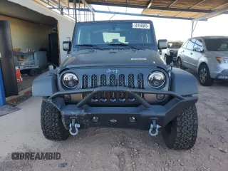 2017 Jeep Wrangler Sport with VIN 1C4AJWAG5HL662456, listed as a Copart auction lot 50166505 with 61,249 mi miles and Salvage Title. Bid and sale history available at DreamBid. Image 5.