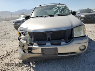 2002 GMC Envoy SLE with VIN 1GKDS13S222376922, listed as a Copart auction lot 69820804 with 246,224 mi miles and Salvage Title. Bid and sale history available at carsss.com. Image 5.